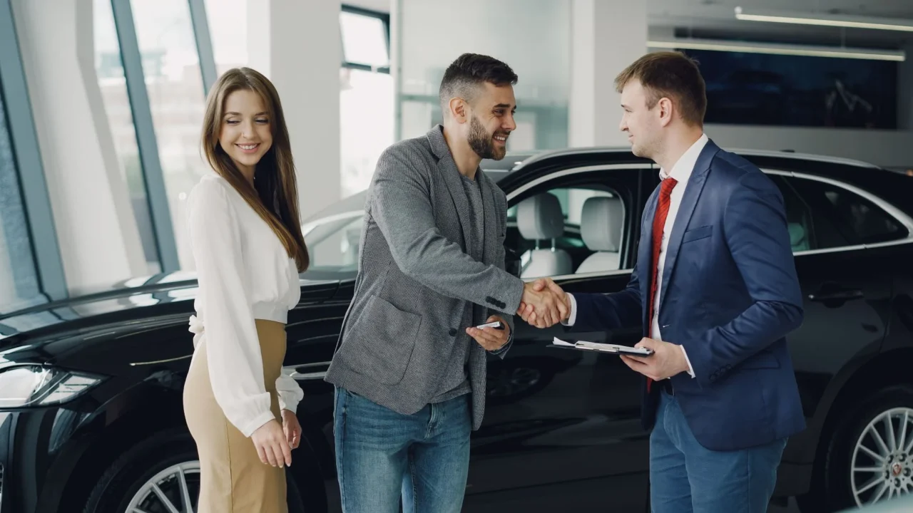 Car Rental Office Handshake Deal
